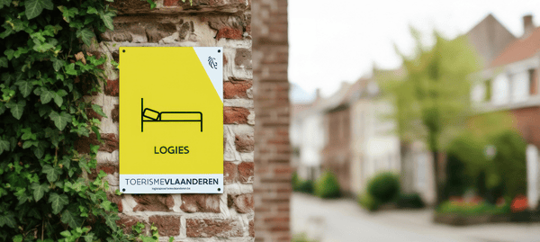 plaatje van erkenning logies Toerisme Vlaanderen op een muur aan een logies plaatje van erkenning logies Toerisme Vlaanderen op een muur aan een logies